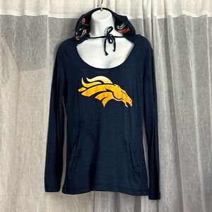 Denver Broncos woman’s long sleeve, hooded tee with pockets.